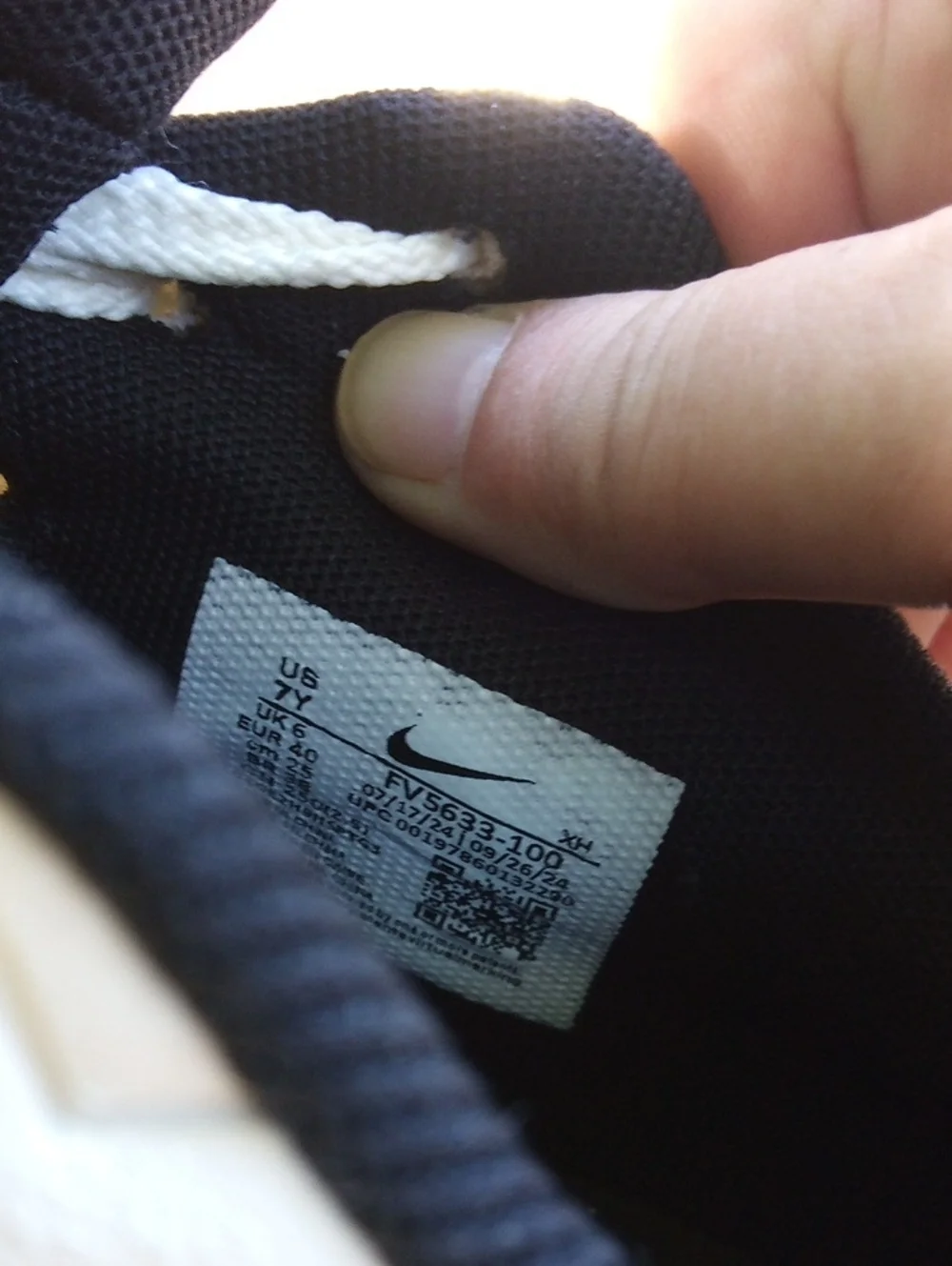 Nike Low-Top Sneakers in Cream and Black